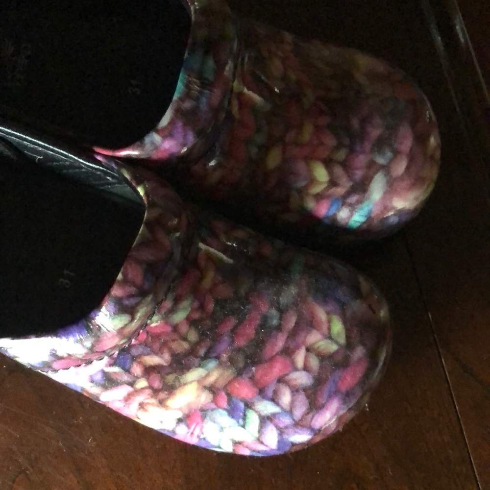 Dansko clogs multi color. Great condition. Only worn a few times.